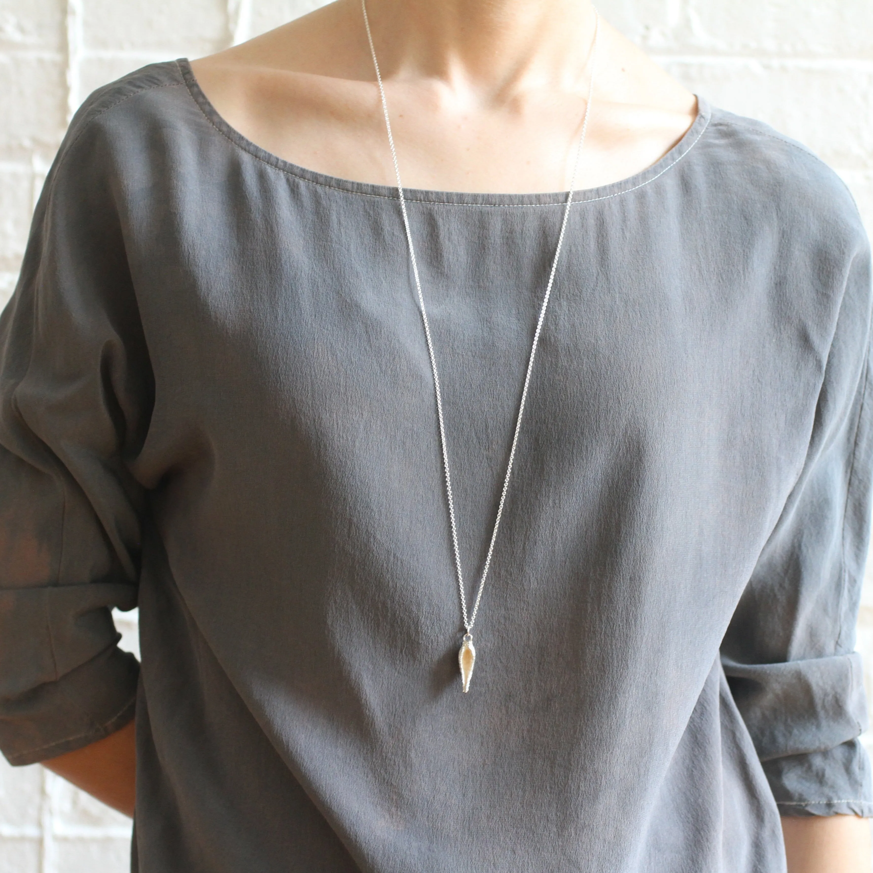 hollow milkweed seed pod necklace