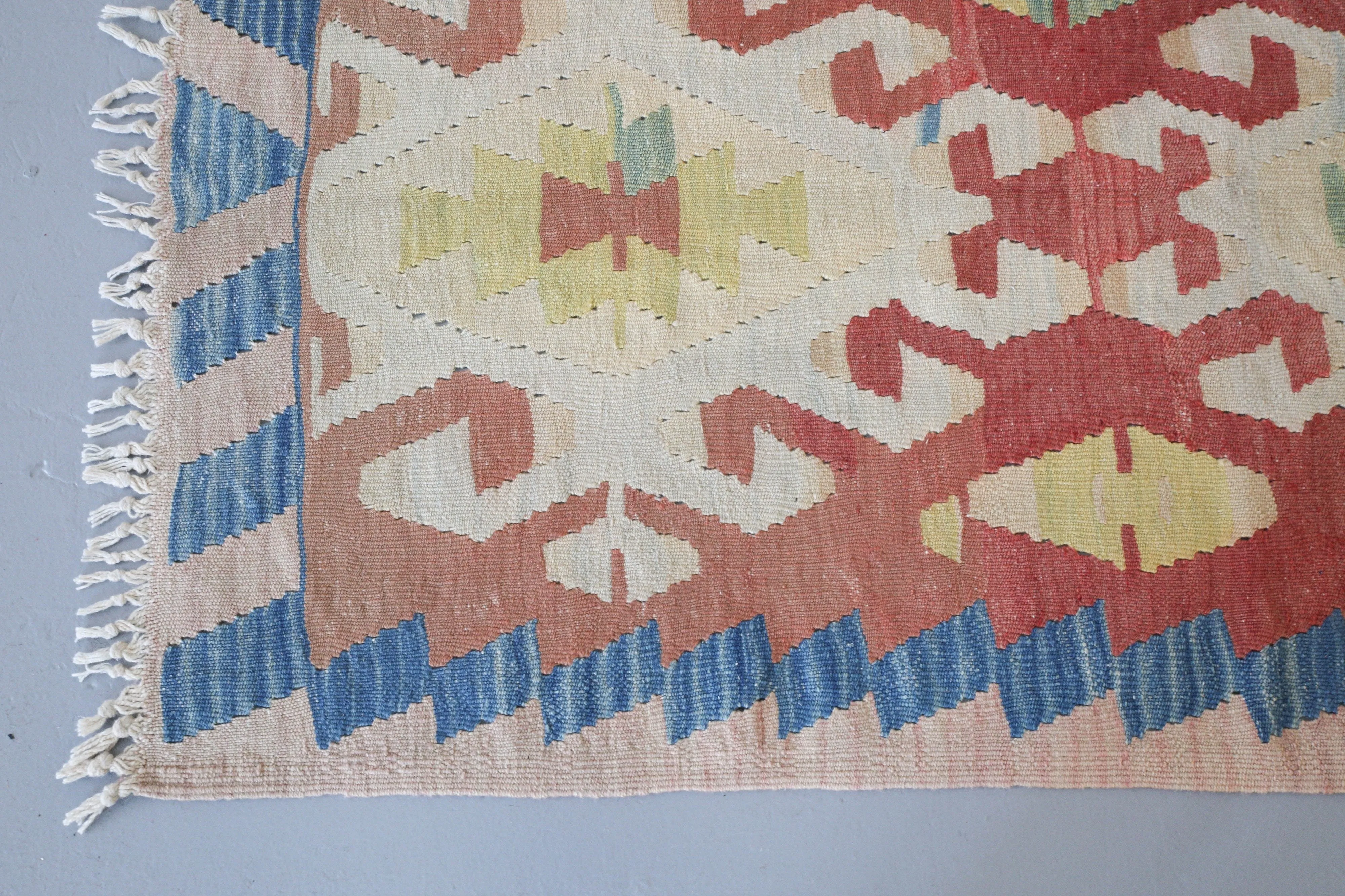 Vintage Anatolian kilim runner rug