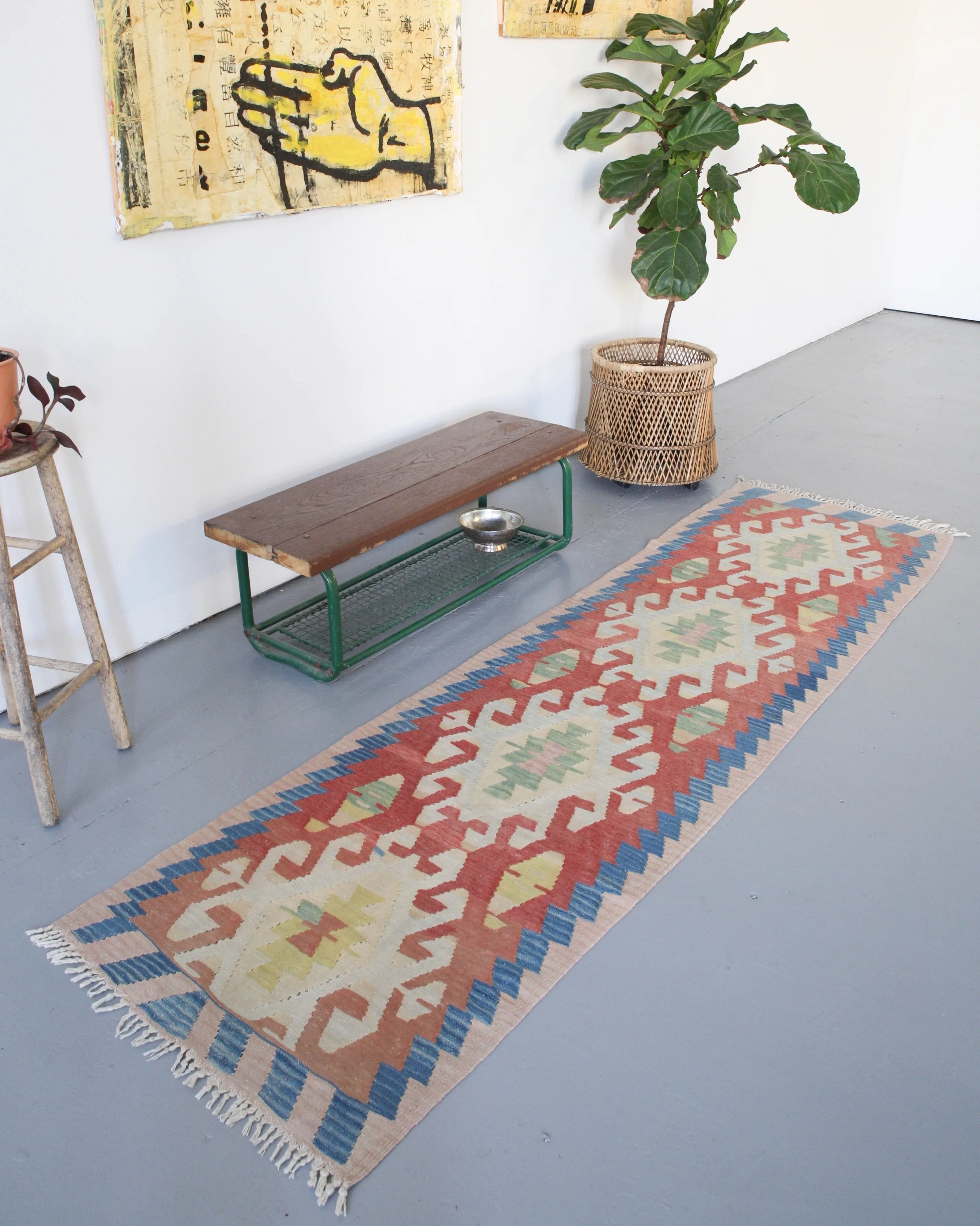 Vintage Anatolian kilim runner rug